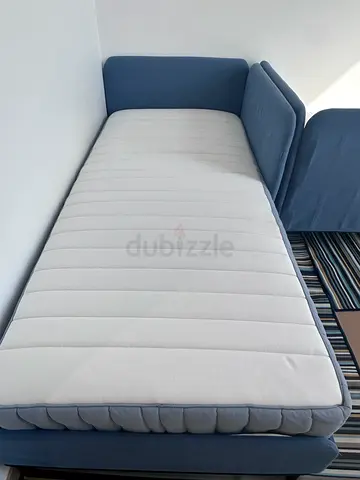 Good as new! 2 single beds with super clean mattresses and mattress protectors (rugs not included)