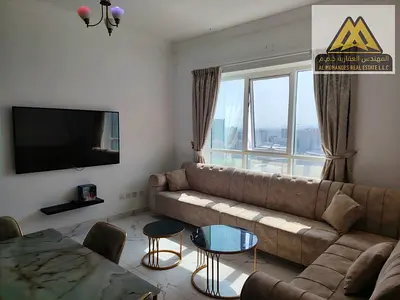 For annual rent | Fully furnished one-bedroom apartment with a living room in Al Waha Towers – Al Rashidiya 1