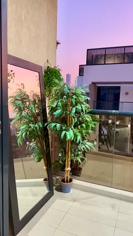 Tall artificial potted plant + pot