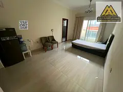 A spacious and elegantly furnished studio apartment with an open view and free internet access, offe