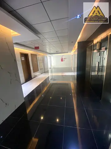 The apartment features a master bedroom with built-in wardrobes, balcony, two bathrooms, central AC, and free maintenance by the landlord, offering co