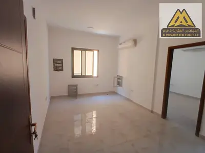 First-occupant one-bedroom apartment with living room in Al Alia, Ajman. Split AC, family building, prime location close to services. AED 29,000 in 4