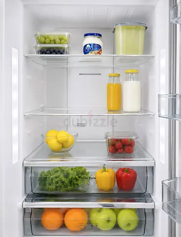 Hoover fridge, used 7 months. Clean, spacious, working perfectly. Bottom freezer. Price negotiable.