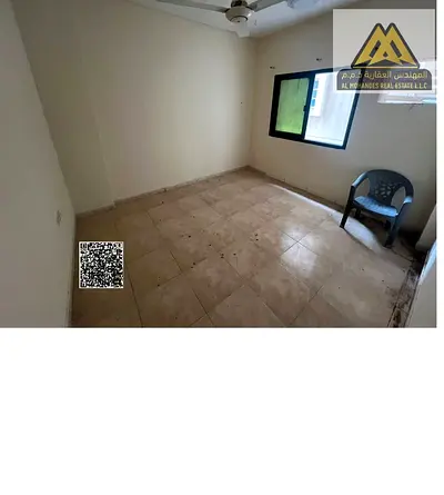 1-bedroom apartment with a hall in Al Rashidiya 1, opposite the Fish Market, balcony, AED 23,000 yearly, payable in 4 or 6 installments, no AC.