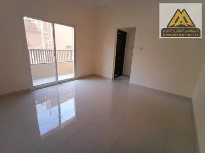 A one-bedroom apartment with a living room for annual rent in Al Rawda 1, Ajman, first-time occupant, in a prime location close to all services and ba