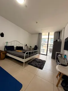 Executive master bedroom with huge balcony in posh building behind burjuman mall