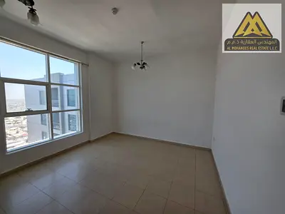 A spacious apartment with a practical layout, featuring a separate living room, balcony, closed kitchen, central AC, free maintenance from the landlor