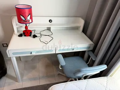 White kids study desk with drawers and matching chair