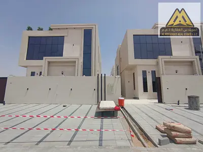 A villa is available for sale in Al Helio, Ajman, featuring a modern design and spacious layout, ideal for luxury family living. The property is loca