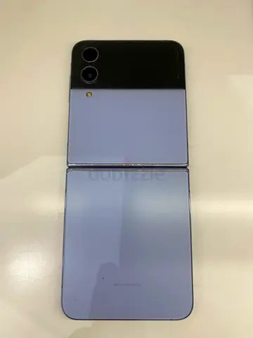 Light purple foldable smartphone with dual rear cameras (used