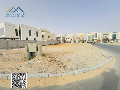 Two corner plots for sale, including registration and ownership fees, with a wide setback in front of the land.