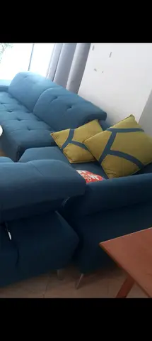 Blue Fabric L-shaped Sofa with Cushions - Good Condition