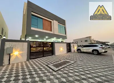 Al Zahya, Ajman, featuring a modern design and spacious layout ideal for family living in a quiet and prime location. The villa includes 6 bedrooms, a