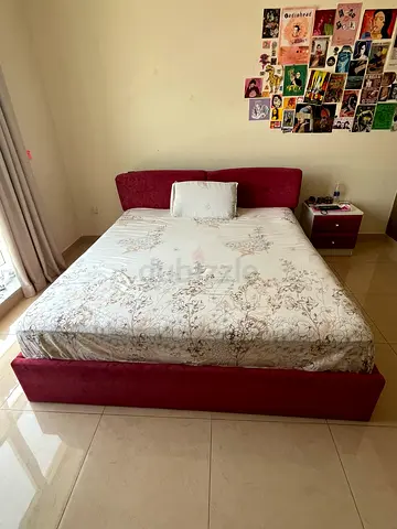 Red upholstered double bed frame with headboard - good condition