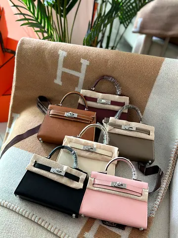 Hermes Small leather top-handle handbags — set of mini Kelly-style bags, assorted colors