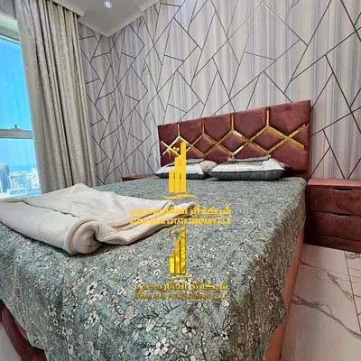 Luxury two-bedroom apartment with a living room in Ajman - Al Rashidiya 1 - Oasis Towers - brand ne