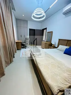 A unique living opportunity A fully furnished, upscale townhouse Located in Al Helio 1,