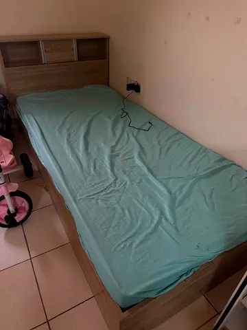 Single wooden bed with headboard storage - good condition