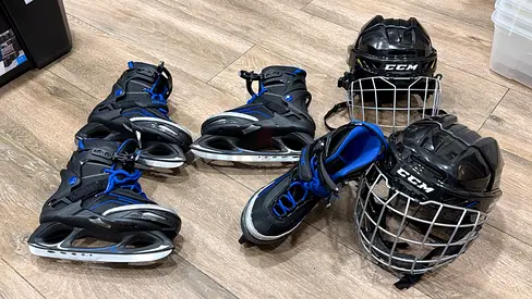 softec children ice skates and helmets . 2 sets for 600 aed , original price over 1000 usd