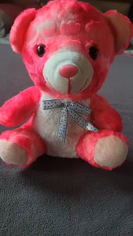 Pink stuffed teddy bear with ribbon - good condition
