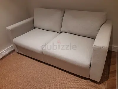 Beige 2-seater sofa in good condition