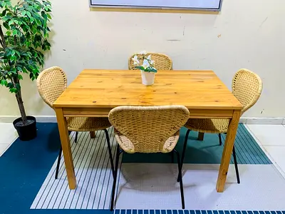 Solid Wood Dining Table with 4 Wicker Chairs - Good Condition
