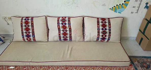 Low seating floor sofa cushion with patterned back cushions - beige, good condition. Arabic Majlis