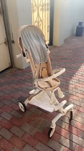 Lightweight beige baby stroller / pram - good condition