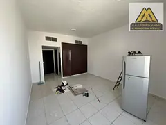 Annual studio for rent in Al Rashidiya 3, Ajman. Spacious layout, central AC, built-in wardrobes, se