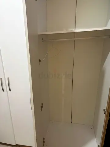 White built-in wardrobe / cupboard - good condition