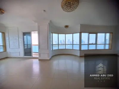 4BR apartment in Al Majaz 3 near Corniche with sea view, maid room, free parking, pool, gym, wardrobes, and super deluxe finishes.