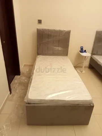 Single upholstered bed with mattress - good condition