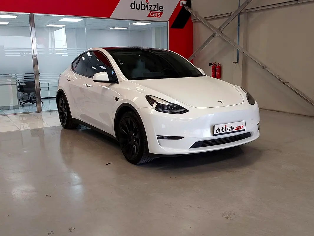 Tesla Model Y 2023 — photo 1 of 15