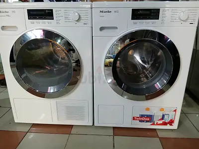 Miele W1 washing machine with TwinDos automatic detergent dosing.The machines are designed for laund