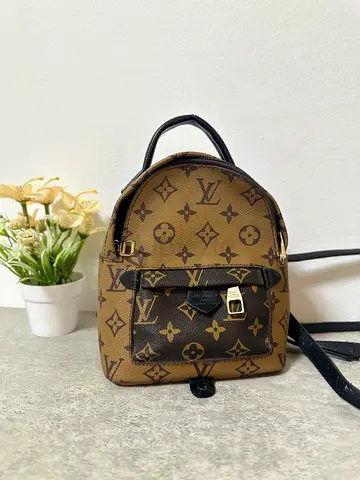 Louis Vuitton StYLE Mini reverse monogram backpack