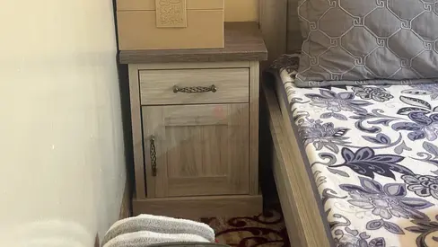 Double wooden nightstand/bedside table in light oak finish - good condition