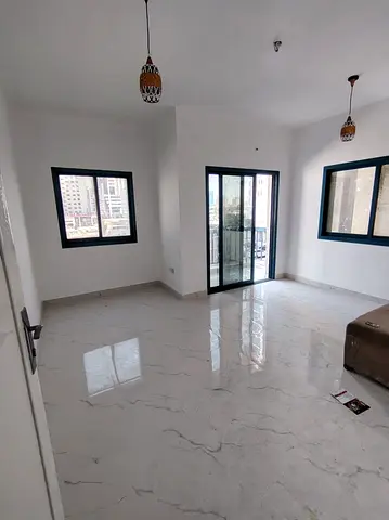 One bedroom and living room for annual rent | Living room | Balcony | Kitchen | Prime location | Cl