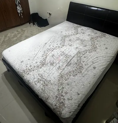 Comfortable Queen Bed with Black Faux Leather Headboard+matching side tables. MATTRESS NOT INCLUDED.