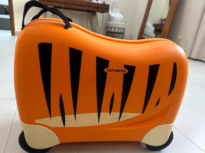 Samsonite Trunki ride-on childrens suitcase / travel suitcase - orange (used)