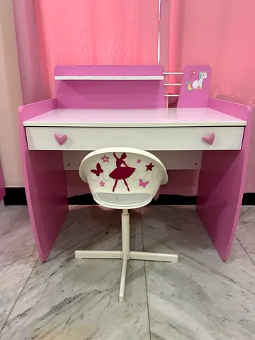 Pink kids vanity table with swivel stool — good condition