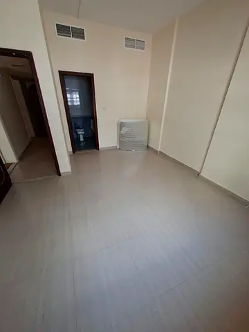 For rent in Al Majaz 1, Sharjah: 2BR + living + store, 2 bathrooms, balcony, central AC. AED 40,000
