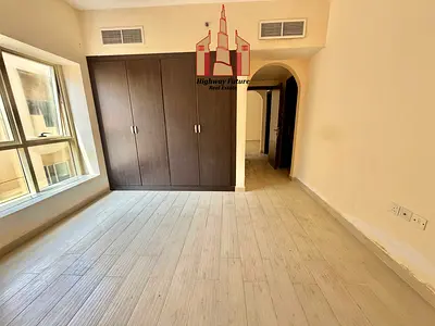 Amazing 1Bedroom And Hall in 42,000 AED With Parking 12 Cheques Payment