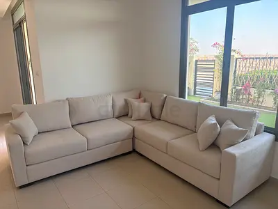 Light beige L-shaped 5-seater corner sofa in excellent condition. Only 3 months old - barely used.