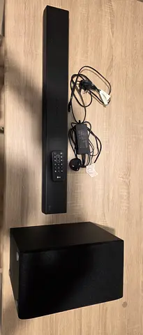 Soundbar with Wireless Subwoofer and Remote - Good Working Condition