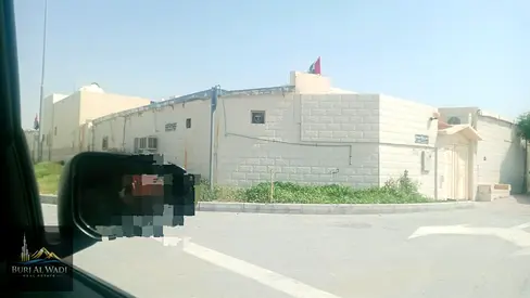 Corner Arabic-style house for sale in Sharjah / Al Ghafia
