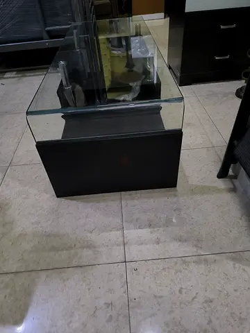 Glass Top Coffee Table with Black Base - Good Condition