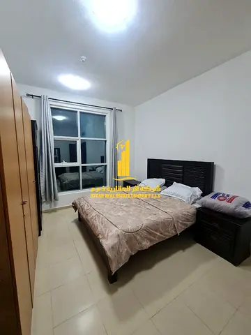 Luxury one-bedroom apartment with a balcony and open views. Ajman City Tower. Fully furnished, avai