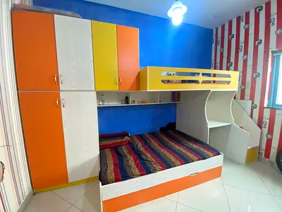 Custom made children’s bunk bed with wardrobe , studytable, 3 mattress and storage dhs 1200