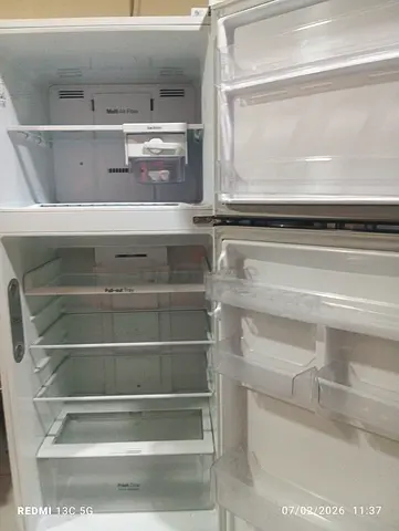 Used Top-Freezer Refrigerator - Clean Interior, Good Condition