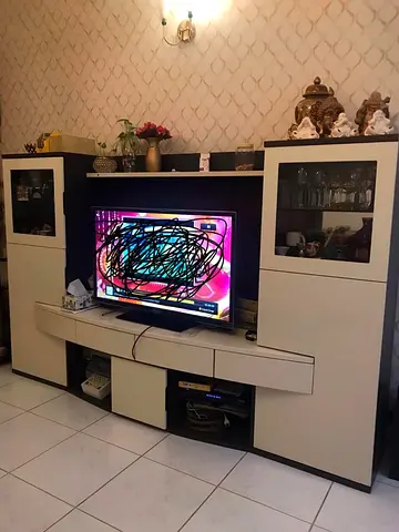 Home center entertainment center with cabinets and TV unit - beige/black
